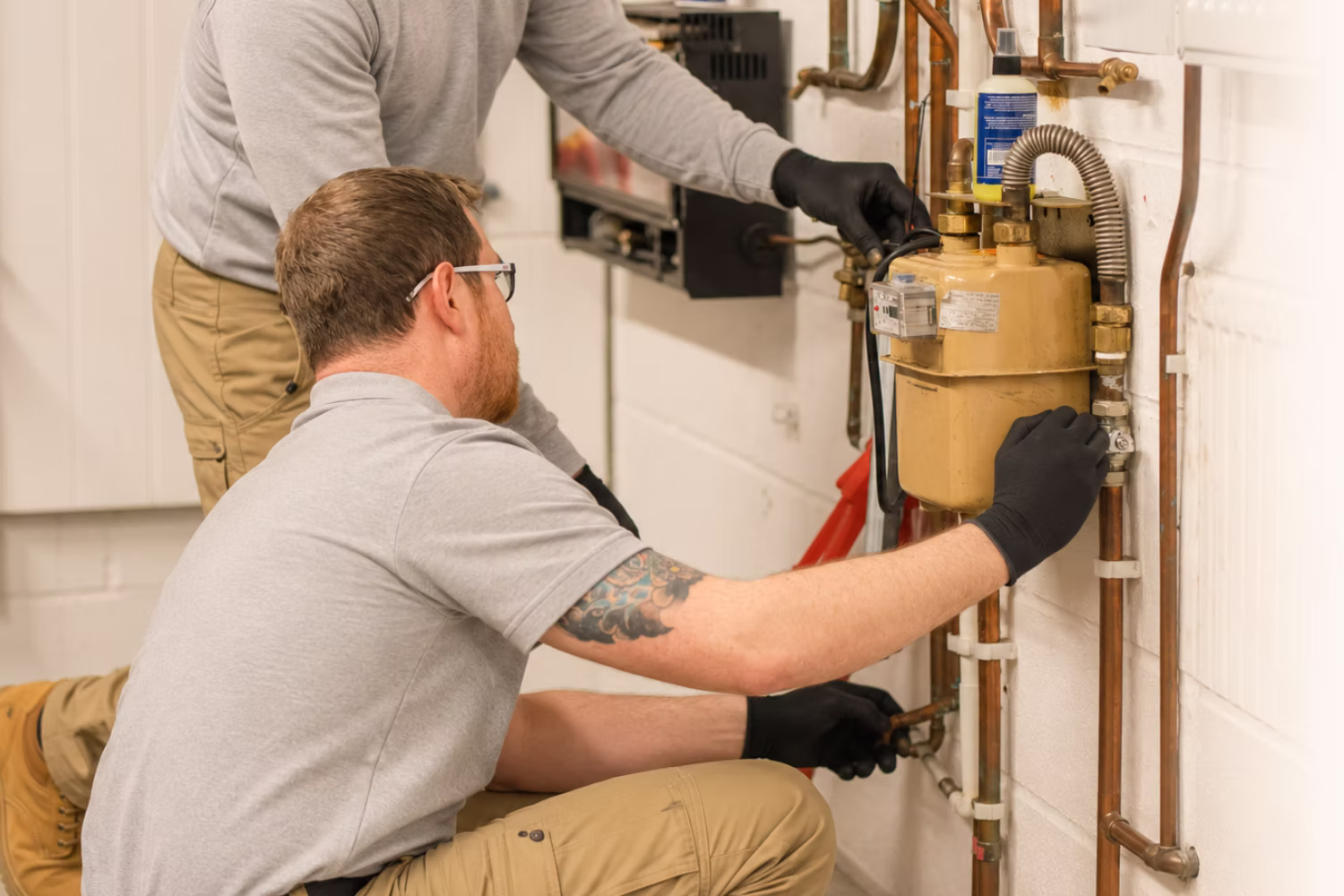 two technician working in heating